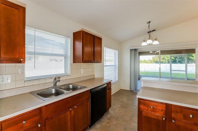 kitchen featuring black dishwasher, lofted ceiling, a healthy amount of sunlight, and sink