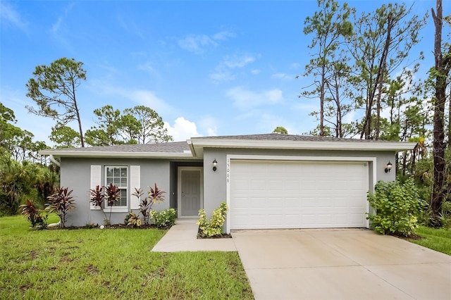 ranch-style home featuring a garage and a front lawn