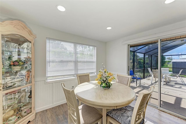 dining area with hardwood / wood-style flooring and a wealth of natural light