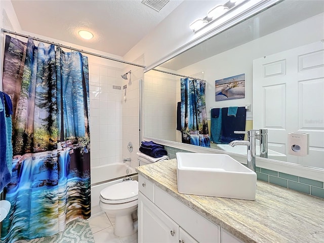 full bathroom with a textured ceiling, vanity, shower / tub combo, tile patterned flooring, and toilet