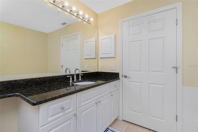 bathroom with vanity and tile patterned floors