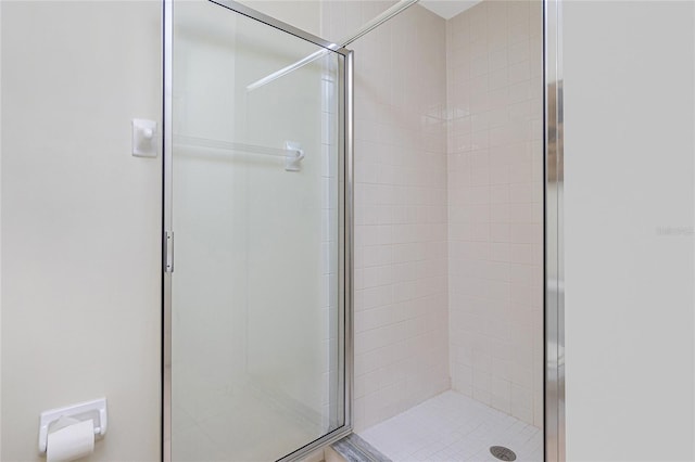 bathroom featuring walk in shower