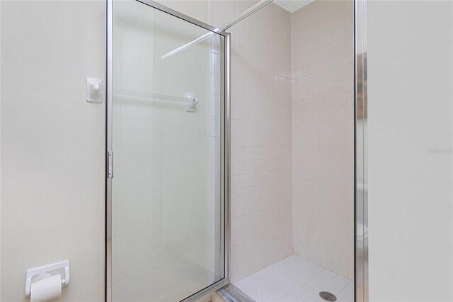 bathroom with a stall shower