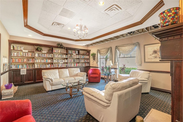 carpeted living room with crown molding, a raised ceiling, and an inviting chandelier