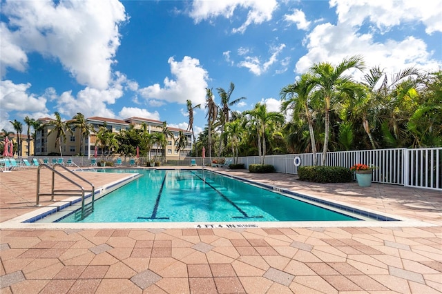 view of swimming pool featuring a patio