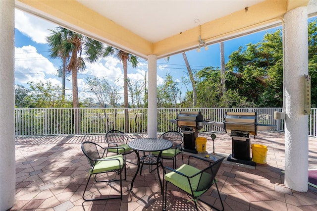 view of patio featuring a grill