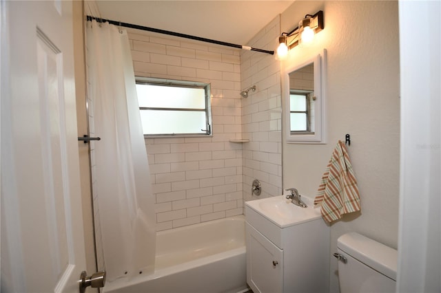 full bathroom featuring vanity, toilet, and shower / bath combo with shower curtain