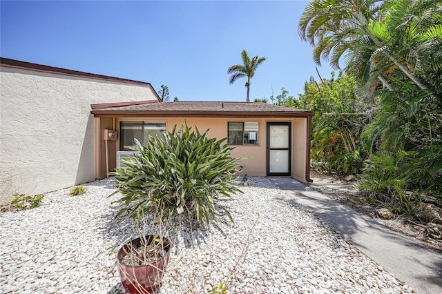 1001 W Marion Ave Unit 14, Punta Gorda, FL 33950 - view of front facade featuring stucco siding