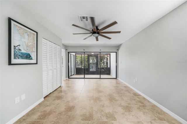 1001 W Marion Ave Unit 14, Punta Gorda, FL 33950 - spare room featuring visible vents, baseboards, and a ceiling fan