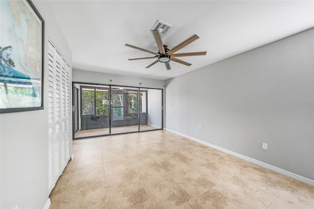 1001 W Marion Ave Unit 14, Punta Gorda, FL 33950 - unfurnished room featuring tile patterned flooring, visible vents, baseboards, and ceiling fan