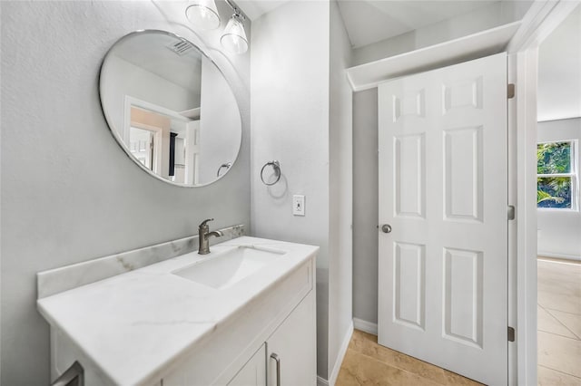 1001 W Marion Ave Unit 14, Punta Gorda, FL 33950 - bathroom featuring vanity, tile patterned flooring, and visible vents