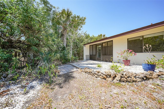 1001 W Marion Ave Unit 14, Punta Gorda, FL 33950 - view of yard featuring a patio
