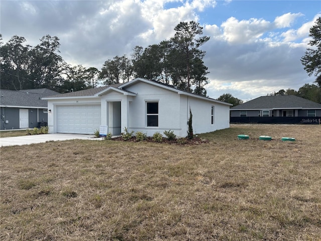 ranch-style home with a garage and a front lawn