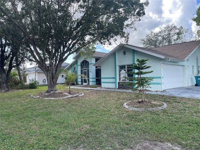 269 Rosemary St, Port Charlotte, FL 33954 - ranch-style house featuring stucco siding, a garage, concrete driveway, and a front yard