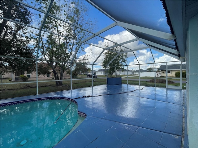 269 Rosemary St, Port Charlotte, FL 33954 - swimming pool with glass enclosure and a patio area