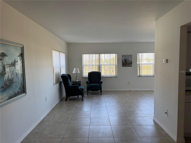 sitting room with light tile patterned flooring