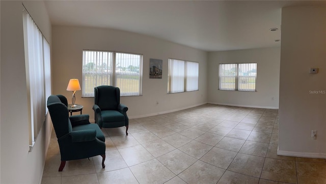 sitting room with light tile patterned flooring