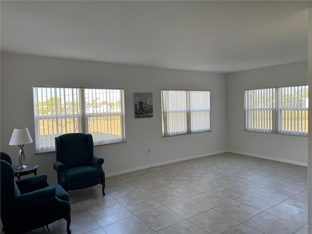 sitting room with light tile patterned floors