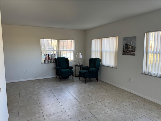 living area with light tile patterned floors