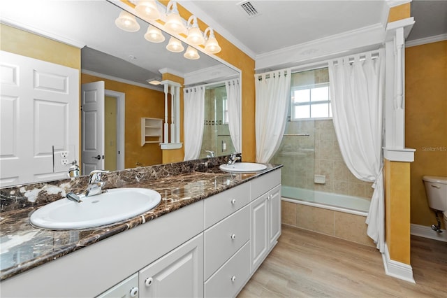 full bathroom with vanity, shower / bath combo with shower curtain, ornamental molding, and hardwood / wood-style floors