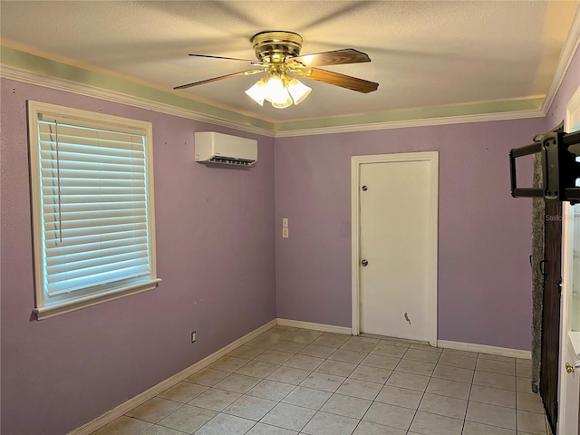 tiled empty room featuring a wall mounted AC, crown molding, ceiling fan, and a textured ceiling