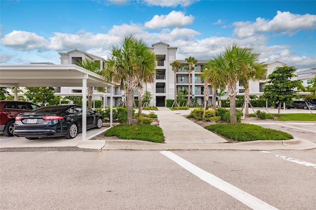 14131 Heritage Landing Blvd Unit 838, Punta Gorda, FL 33955 - view of property featuring covered and uncovered parking