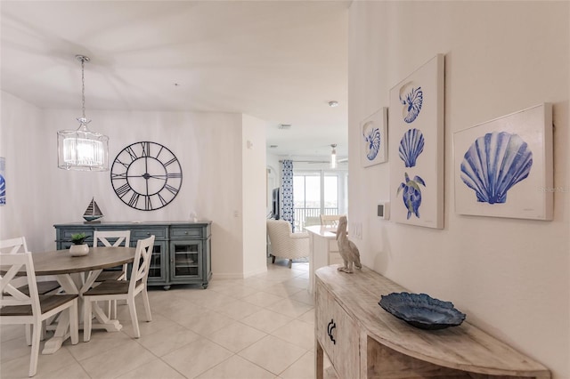 14131 Heritage Landing Blvd Unit 838, Punta Gorda, FL 33955 - dining room with light tile patterned flooring and a chandelier