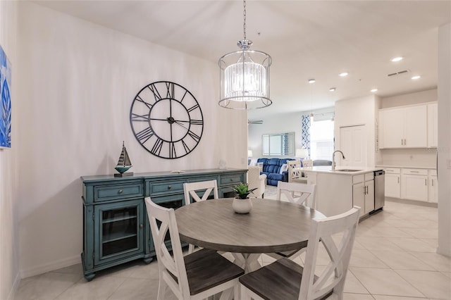 14131 Heritage Landing Blvd Unit 838, Punta Gorda, FL 33955 - dining area with light tile patterned floors, visible vents, baseboards, recessed lighting, and a notable chandelier