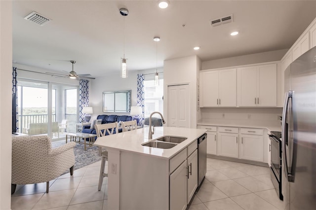 14131 Heritage Landing Blvd Unit 838, Punta Gorda, FL 33955 - kitchen with visible vents, appliances with stainless steel finishes, open floor plan, and a sink