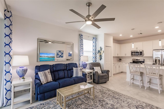 14131 Heritage Landing Blvd Unit 838, Punta Gorda, FL 33955 - living area featuring light tile patterned flooring, visible vents, recessed lighting, and ceiling fan