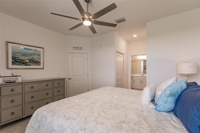 14131 Heritage Landing Blvd Unit 838, Punta Gorda, FL 33955 - carpeted bedroom featuring recessed lighting, visible vents, connected bathroom, and a ceiling fan