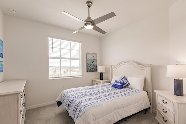 14131 Heritage Landing Blvd Unit 838, Punta Gorda, FL 33955 - bedroom with baseboards, a ceiling fan, and carpet flooring