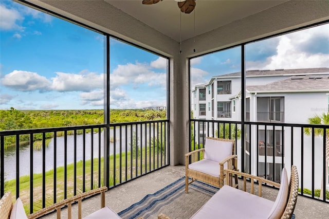 14131 Heritage Landing Blvd Unit 838, Punta Gorda, FL 33955 - sunroom / solarium with a ceiling fan and a water view