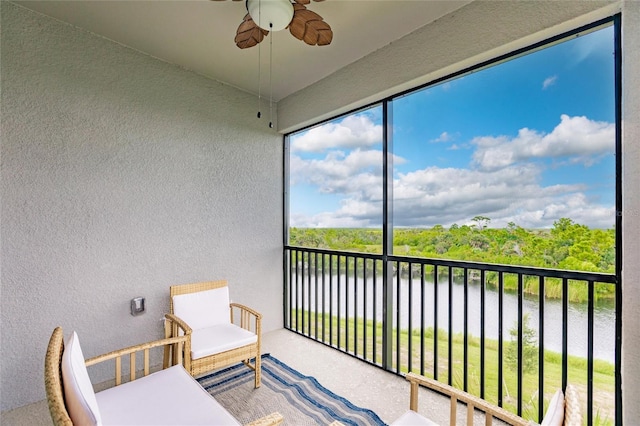 14131 Heritage Landing Blvd Unit 838, Punta Gorda, FL 33955 - sunroom featuring a water view and a ceiling fan
