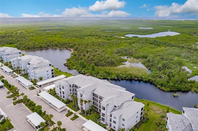 14131 Heritage Landing Blvd Unit 838, Punta Gorda, FL 33955 - drone / aerial view with a forest view and a water view