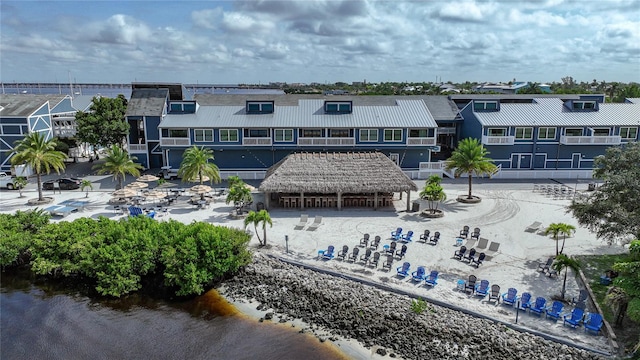 drone / aerial view featuring a water view