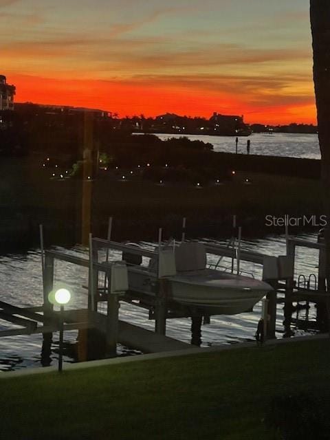 dock area featuring a water view