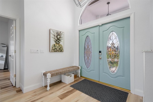 entryway featuring french doors and light hardwood / wood-style flooring