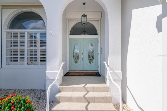 doorway to property with french doors