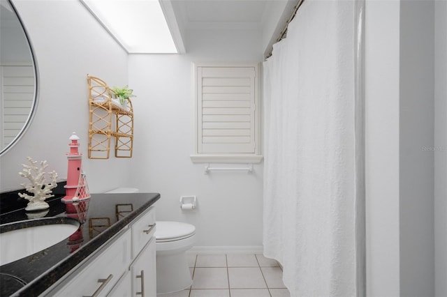 bathroom featuring tile patterned flooring, toilet, ornamental molding, and vanity