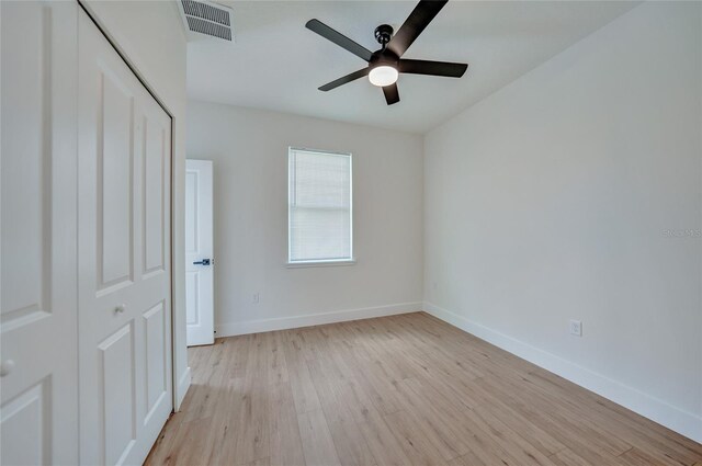 interior space featuring light hardwood / wood-style flooring and ceiling fan