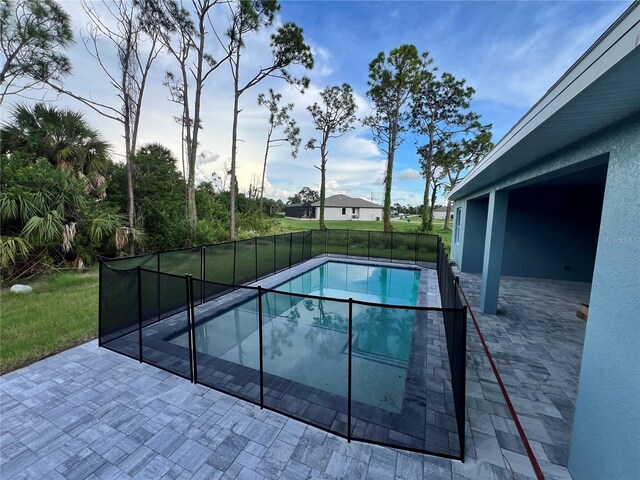 view of pool featuring a patio area