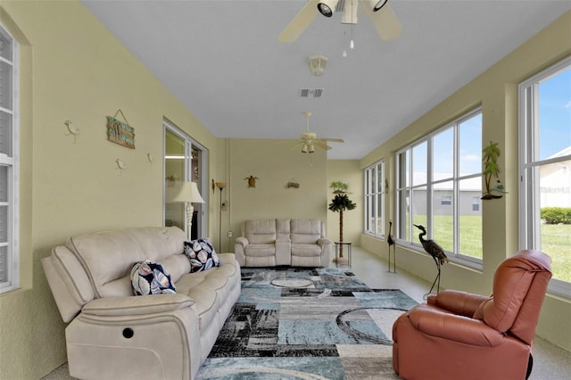 sunroom with ceiling fan