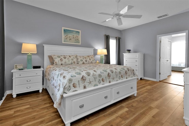 bedroom featuring hardwood / wood-style floors and ceiling fan