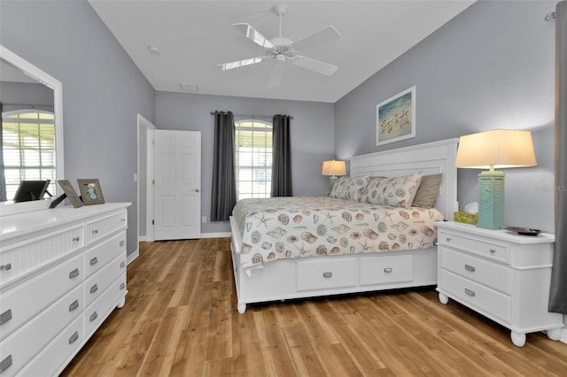 bedroom featuring ceiling fan and hardwood / wood-style flooring