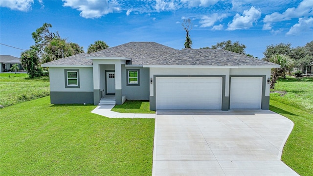 view of front of property featuring a garage and a front lawn