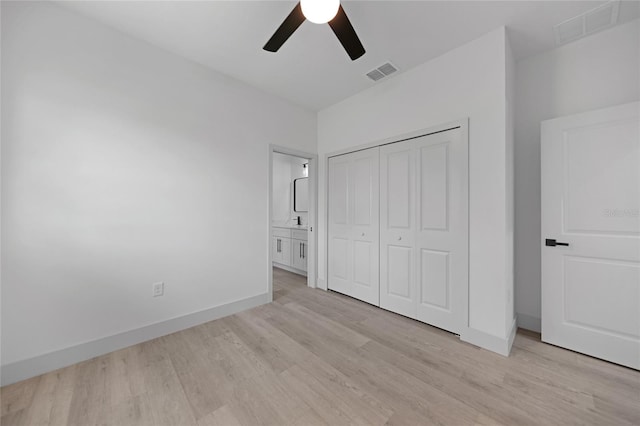 unfurnished bedroom with a closet, ceiling fan, and light hardwood / wood-style floors