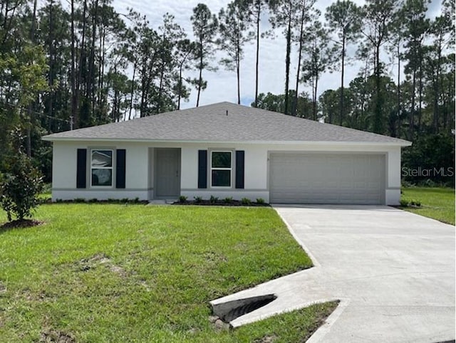 single story home with a garage and a front yard