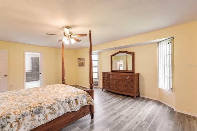 bedroom with wood-type flooring and ceiling fan