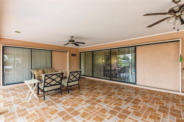 view of patio / terrace featuring ceiling fan